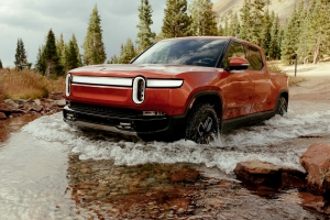 Electric vehicle startup Rivian is now a publicly traded company after executing one of the biggest initial public offerings in history.