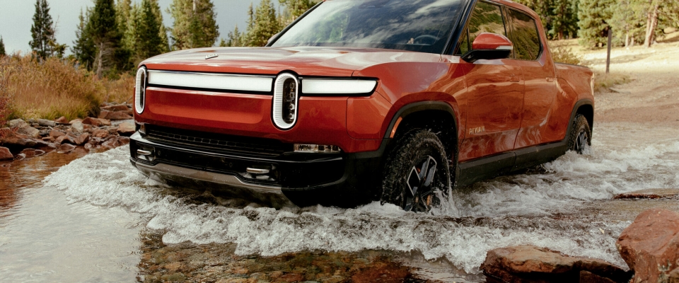 Electric vehicle startup Rivian is now a publicly traded company after executing one of the biggest initial public offerings in history.